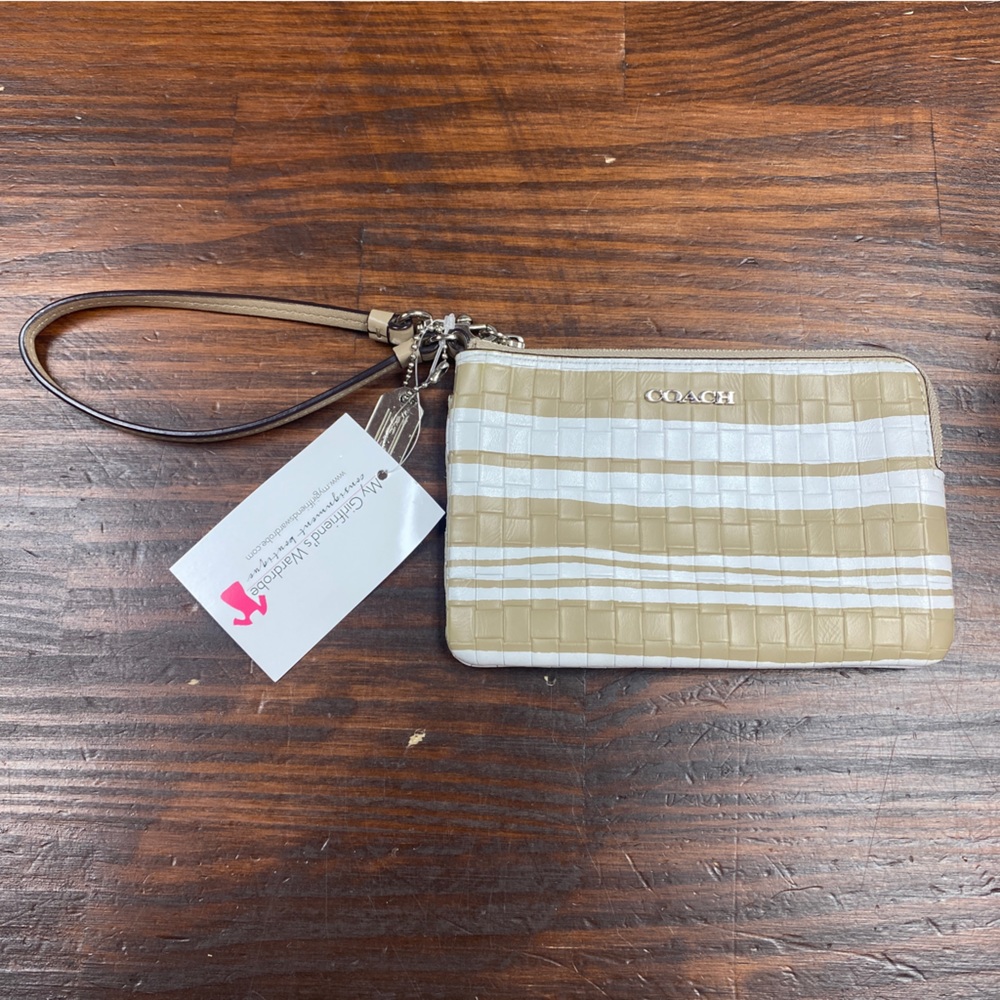 Coach tan white leather wristlet